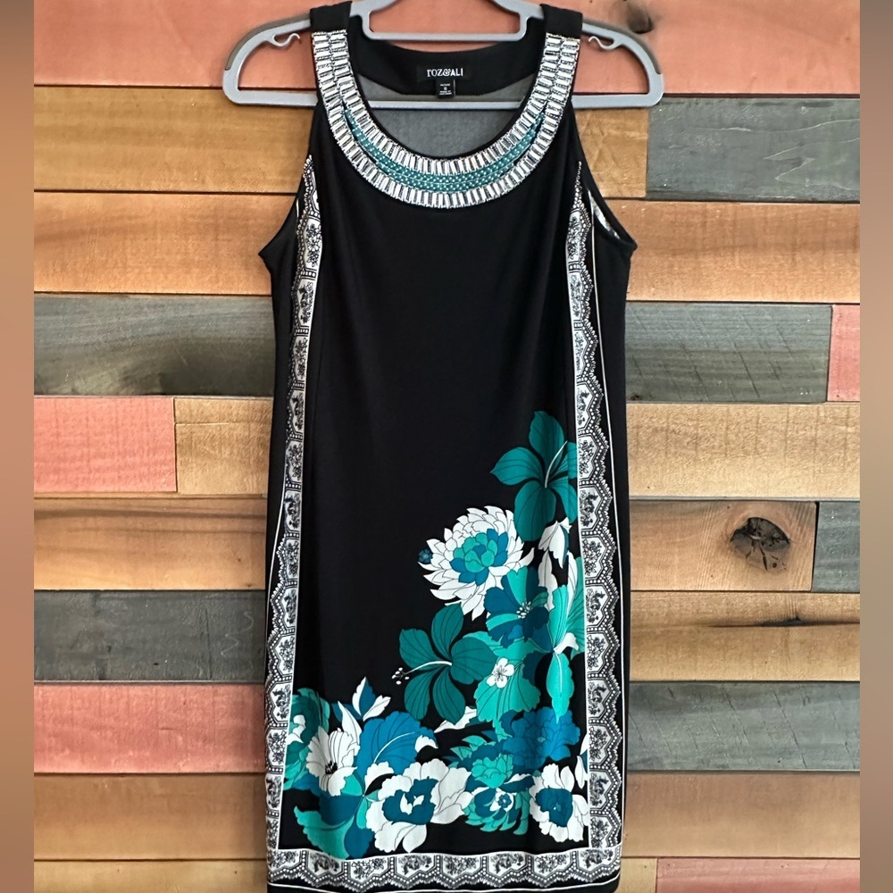 Roz & Ali dress with teal and white floral print and a beaded neckline